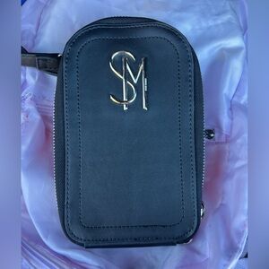 Small crossbody purse with card slots on the back